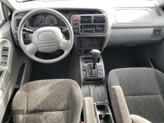 2004 Chevrolet Tracker LT z VIN 2CNBE634346901609, wystawiony jako Copart lot #86977504 z przebiegiem 59 089 mil mil oraz Szkoda całkowita • Salvage title. Historia ofert i sprzedaży dostępna na DreamBid. Obrazek 8.