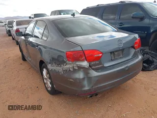 2012 Volkswagen Jetta SE with VIN 3VWDX7AJ0CM121106, listed as a IAAI auction lot 42624460 with 196,937 mi miles and . Bid and sale history available at DreamBid. Image 3.