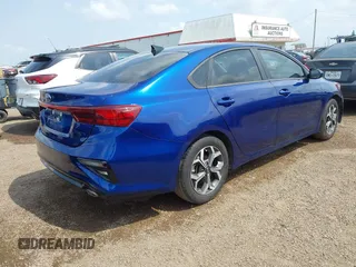 2021 Kia Forte LXS with VIN 3KPF24AD5ME384836, listed as a IAAI auction lot 42098713 with 29,107 mi miles and . Bid and sale history available at DreamBid. Image 4.