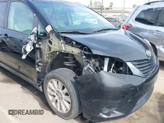 2012 Toyota Sienna LE with VIN 5TDJK3DC0CS037989, listed as a IAAI auction lot 41622546 with 165,363 mi miles. Bid and sale history available at carsss.com. Image 6.