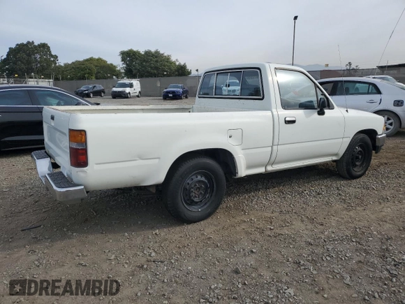 1993 Toyota Pickup DX with VIN JT4RN81P4P5168613, listed as a Copart auction lot 82611524 with 200,408 mi miles and Clean title. Bid and sale history available at DreamBid. Image 3.
