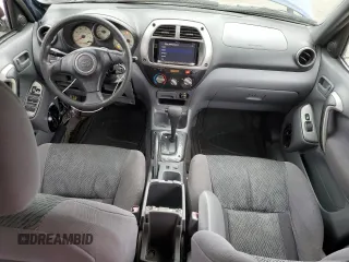 2003 Toyota RAV4 z VIN JTEGH20V130110487, wystawiony jako Copart lot #72700364 z przebiegiem 197 260 mil mil oraz Szkoda całkowita • Salvage title. Historia ofert i sprzedaży dostępna na DreamBid. Obrazek 8.
