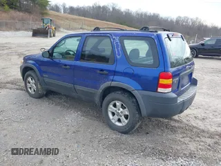 2006 Ford Escape XLT with VIN 1FMYU03146KB87070, listed as a IAAI auction lot 41451676 with 180,415 mi miles. Bid and sale history available at carsss.com. Image 3.