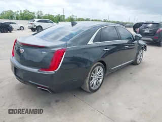 2019 Cadillac XTS Luxury with VIN 2G61M5S33K9113899, listed as a IAAI auction lot 42063952 with 148,773 mi miles and . Bid and sale history available at DreamBid. Image 4.