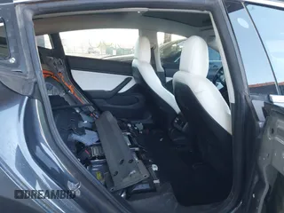 2018 Tesla Model 3 Long Range Battery with VIN 5YJ3E1EA3JF169132, listed as a IAAI auction lot 41678383 with 170,809 mi miles and . Bid and sale history available at DreamBid. Image 8.