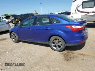 2013 Ford Focus SE with VIN 1FADP3F29DL352186, listed as a Copart auction lot 64972835 with 74,409 mi miles and Clean title. Bid and sale history available at DreamBid. Image 2.