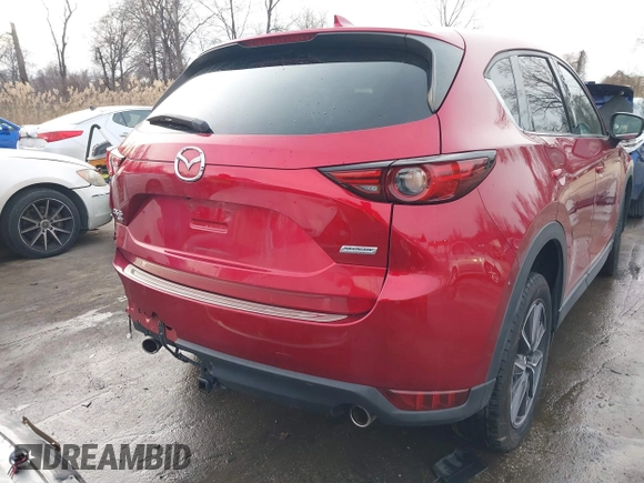 2018 Mazda CX-5 Grand Touring with VIN JM3KFBDM8J0406276, listed as a IAAI auction lot 41447355 with 70,772 mi miles. Bid and sale history available at carsss.com. Image 18.
