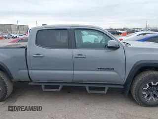 2021 Toyota Tacoma 4WD SR5 with VIN 3TMDZ5BN5MM116584, listed as a IAAI auction lot 41548175 with 23,031 mi miles. Bid and sale history available at carsss.com. Image 13.