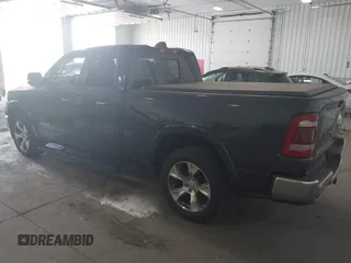2020 Ram 1500 Laramie with VIN 1C6SRFDT7LN142009, listed as a IAAI auction lot 42330341 with 108,351 mi miles and . Bid and sale history available at DreamBid. Image 3.