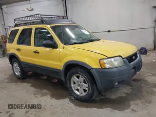 2003 Ford Escape XLT Popular 2 with VIN 1FMYU93113KA13036, listed as a IAAI auction lot 42805511 with 193,165 mi miles and . Bid and sale history available at DreamBid. Image 1.