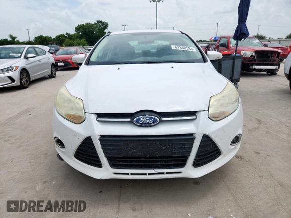 2013 Ford Focus SE with VIN 1FADP3F20DL289978, listed as a Copart auction lot 63350585 with 211,677 mi miles and Salvage title. Bid and sale history available at DreamBid. Image 5.