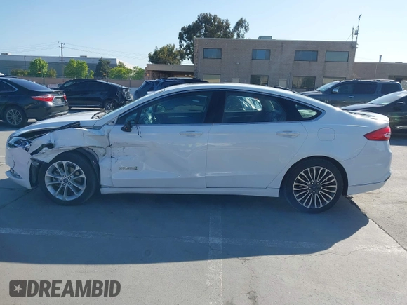 2017 Ford Fusion Hybrid Titanium с VIN 3FA6P0RU3HR323164, выставлен на аукционе IAAI как лот 42303571 с пробегом 119 732 миль миль и . История ставок и продаж доступна на DreamBid. Изображение 15.
