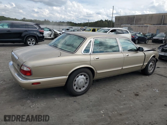 1999 Jaguar XJ z VIN SAJKX6048XC849376, wystawiony jako Copart lot #70538064 z przebiegiem 122 891 mil mil oraz Szkoda całkowita • Salvage title. Historia ofert i sprzedaży dostępna na DreamBid. Obrazek 3.