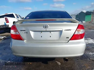 2003 Toyota Camry LE z VIN 4T1BF32K03U561492, wystawiony jako IAAI lot #41607321 z przebiegiem 171 920 mil mil oraz . Historia ofert i sprzedaży dostępna na DreamBid. Obrazek 16.