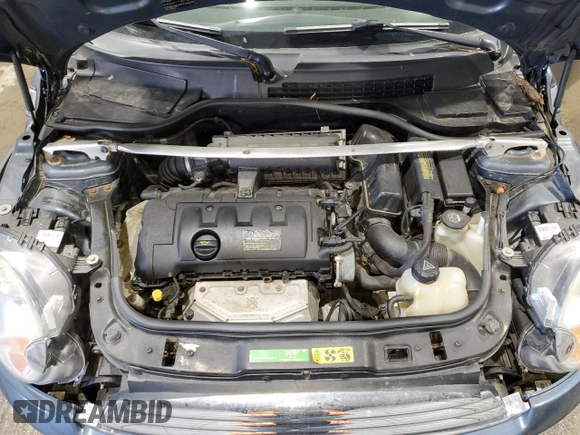 2009 MINI Convertible z VIN WMWMR335X9TJ93685, wystawiony jako Copart lot #50899755 z przebiegiem 123 609 mil mil oraz Szkoda całkowita • Salvage title. Historia ofert i sprzedaży dostępna na DreamBid. Obrazek 11.