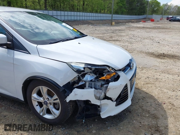 2012 Ford Focus SE with VIN 1FAHP3F2XCL122141, listed as a IAAI auction lot 42008877 with 122,743 mi miles. Bid and sale history available at carsss.com. Image 6.