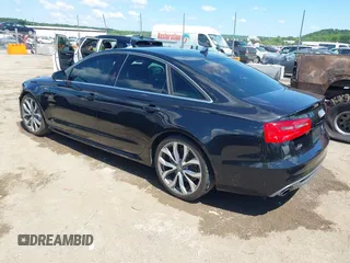 2014 Audi A6 Prestige with VIN WAUHGAFC9EN027338, listed as a IAAI auction lot 42377190 with 164,427 mi miles and . Bid and sale history available at DreamBid. Image 3.