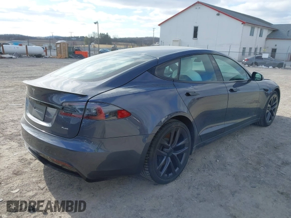 2021 Tesla Model S Plaid with VIN 5YJSA1E60MF455768, listed as a IAAI auction lot 41603504 with 27,398 mi miles. Bid and sale history available at carsss.com. Image 4.