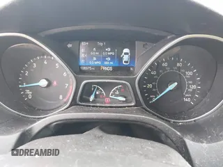 2016 Ford Focus SE with VIN 1FADP3F20GL228831, listed as a IAAI auction lot 42115033 with 106,975 mi miles. Bid and sale history available at carsss.com. Image 7.