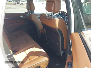 2015 Jeep Grand Cherokee Summit with VIN 1C4RJFJG1FC797711, listed as a IAAI auction lot 42026431 with 101,075 mi miles and . Bid and sale history available at DreamBid. Image 8.