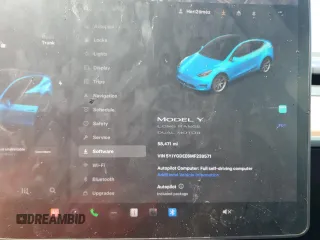 2021 Tesla Model Y Long Range z VIN 5YJYGDEE6MF239571, wystawiony jako Copart lot #56433595 z przebiegiem 58 471 mil mil oraz Szkoda całkowita • Salvage title. Historia ofert i sprzedaży dostępna na DreamBid. Obrazek 9.
