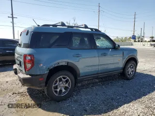 2023 Ford Bronco Sport Badlands z VIN 3FMCR9D9XPRE02582, wystawiony jako Copart lot #46403845 z przebiegiem 26 713 mil mil oraz Nie do naprawy • Non repairable. Historia ofert i sprzedaży dostępna na DreamBid. Obrazek 3.