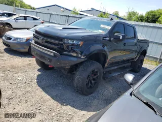 2019 Chevrolet Silverado 1500 LTZ with VIN 3GCUYGEL5KG147953, listed as a Copart auction lot 59009204 with 61,984 mi miles and Salvage Title. Bid and sale history available at carsss.com. Image 1.