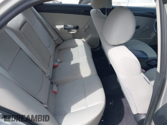 2010 Kia Forte LX with VIN KNAFT4A22A5108680, listed as a IAAI auction lot 42068889 with 77,329 mi miles. Bid and sale history available at carsss.com. Image 8.