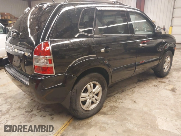2007 Hyundai Tucson SE with VIN KM8JN12D97U636846, listed as a IAAI auction lot 41818368 with 199,996 mi miles. Bid and sale history available at carsss.com. Image 4.