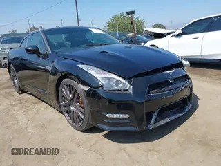2016 Nissan GT-R Premium z VIN JN1AR5EF8GM290918, wystawiony jako IAAI lot #42476340 z przebiegiem 23 667 mil mil oraz . Historia ofert i sprzedaży dostępna na DreamBid. Obrazek 1.