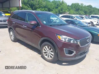 2018 Kia Sorento L with VIN 5XYPG4A33JG401399, listed as a IAAI auction lot 42043961 with 102,848 mi miles. Bid and sale history available at carsss.com. Image 1.