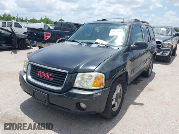 2005 GMC Envoy SLE with VIN 1GKDS13SX52373187, listed as a IAAI auction lot 42434190 with 112,965 mi miles and . Bid and sale history available at DreamBid. Image 2.