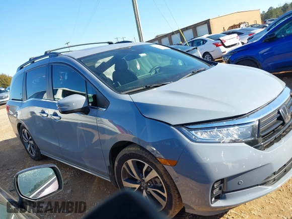 2023 Honda Odyssey Touring with VIN 5FNRL6H84PB005208, listed as a IAAI auction lot 41374452 with 60,288 mi miles and . Bid and sale history available at DreamBid. Image 14.