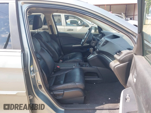 2012 Honda CR-V EX-L with VIN JHLRM4H75CC005611, listed as a IAAI auction lot 42639621 with 231,353 mi miles and . Bid and sale history available at DreamBid. Image 5.