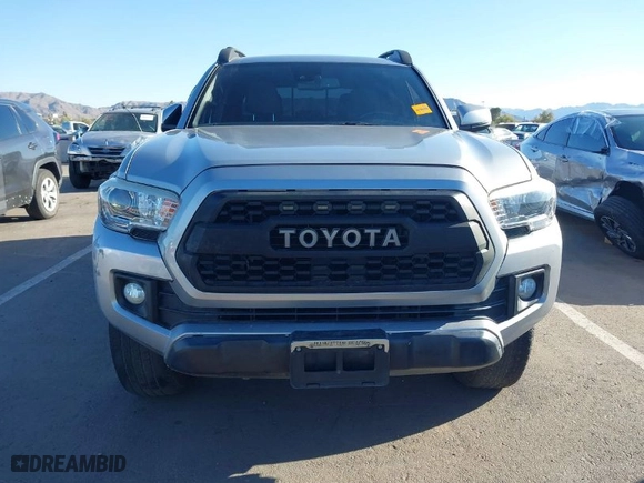 2018 Toyota Tacoma SR with VIN 3TMCZ5AN1JM141605, listed as a IAAI auction lot 41558201 with 91,855 mi miles. Bid and sale history available at carsss.com. Image 6.