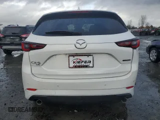 2025 Mazda CX-5 2.5 S Premium Plus Package with VIN JM3KFBEM7S0569274, listed as a Copart auction lot 43468165 with 4,922 mi miles and Salvage Title. Bid and sale history available at carsss.com. Image 6.