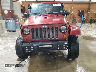 2007 Jeep Wrangler Unlimited Sahara with VIN 1J4GA59197L104784, listed as a Copart auction lot 56700205 with 156,382 mi miles and Salvage title. Bid and sale history available at DreamBid. Image 5.