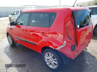 2012 Kia Soul + with VIN KNDJT2A63C7400592, listed as a IAAI auction lot 41836900 with 103,535 mi miles. Bid and sale history available at carsss.com. Image 3.