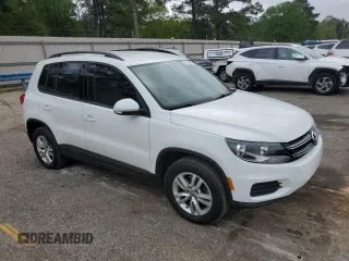 2017 Volkswagen Tiguan S with VIN WVGAV7AX0HK021419, listed as a Copart auction lot 51510935 with 97,084 mi miles and Salvage Title. Bid and sale history available at DreamBid. Image 4.