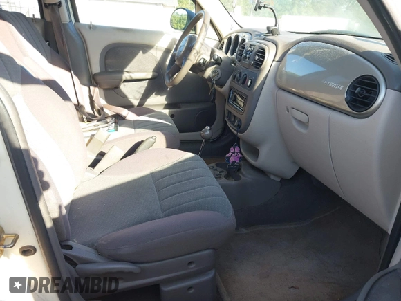 2005 Chrysler PT Cruiser Touring z VIN 3C4FY58B05T535314, wystawiony jako IAAI lot #42283310 z przebiegiem 112 884 mil mil oraz . Historia ofert i sprzedaży dostępna na DreamBid. Obrazek 5.