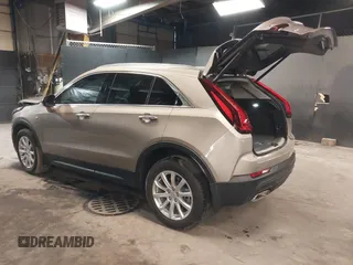 2023 Cadillac XT4 AWD Luxury with VIN 1GYFZBR48PF174059, listed as a IAAI auction lot 41505630 with 4,757 mi miles. Bid and sale history available at carsss.com. Image 3.