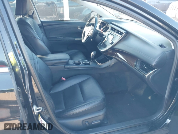 2013 Toyota Avalon XLE with VIN 4T1BK1EB2DU044496, listed as a IAAI auction lot 41573509 with 214,879 mi miles and . Bid and sale history available at DreamBid. Image 5.