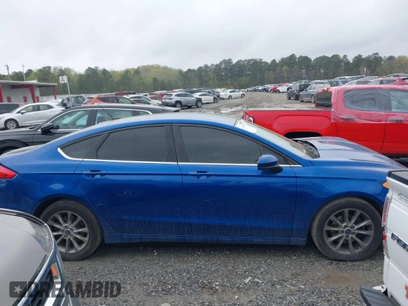 2017 Ford Fusion SE z VIN 3FA6P0H77HR309263, wystawiony jako IAAI lot #41914769 z przebiegiem 136 833 mil mil oraz . Historia ofert i sprzedaży dostępna na DreamBid. Obrazek 12.