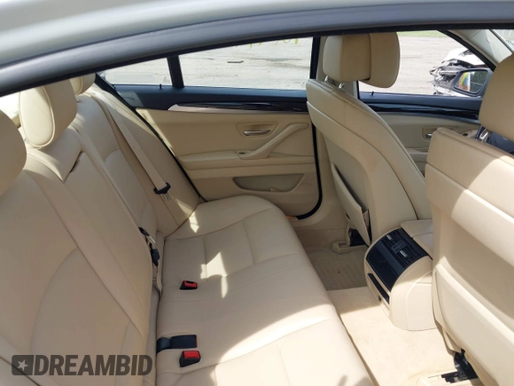 2013 BMW 5 Series 528i xDrive with VIN WBAXH5C54DD107317, listed as a IAAI auction lot 42244446 with 47,858 mi miles and . Bid and sale history available at DreamBid. Image 8.