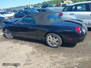 2002 Ford Thunderbird w/Hardtop Premium with VIN 1FAHP60AX2Y116200, listed as a IAAI auction lot 40129557 with 88,991 mi miles. Bid and sale history available at carsss.com. Image 14.