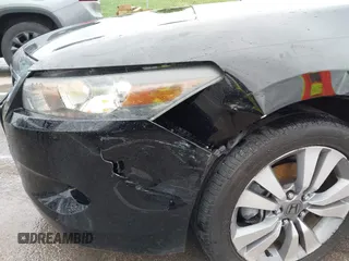 2009 Honda Accord LX-S with VIN 1HGCS12339A010440, listed as a IAAI auction lot 42045025 with 126,767 mi miles and . Bid and sale history available at DreamBid. Image 6.
