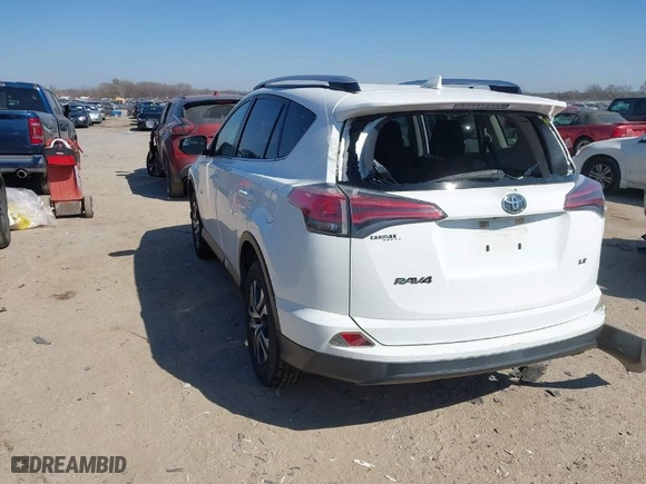 2016 Toyota RAV4 LE with VIN JTMZFREV7GJ096390, listed as a IAAI auction lot 41599268 with 94,568 mi miles. Bid and sale history available at carsss.com. Image 3.