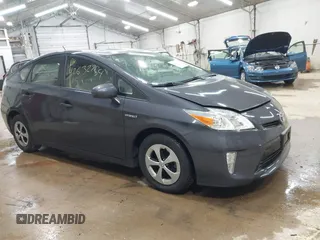 2015 Toyota Prius Four with VIN JTDKN3DU9F0479021, listed as a IAAI auction lot 42632754 with 77,400 mi miles and . Bid and sale history available at DreamBid. Image 1.
