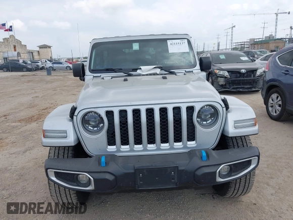 2023 Jeep Wrangler Sahara with VIN 1C4JJXP62PW627455, listed as a IAAI auction lot 42115137 with 62,143 mi miles and . Bid and sale history available at DreamBid. Image 12.