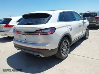 2019 Lincoln Nautilus Reserve with VIN 2LMPJ6L96KBL12639, listed as a IAAI auction lot 42081118 with 23,741 mi miles. Bid and sale history available at carsss.com. Image 4.